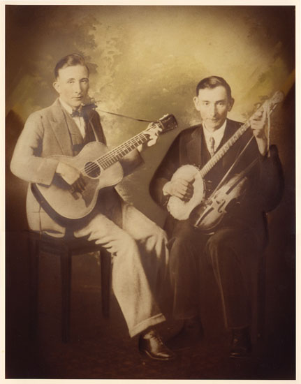 scan of two guys with instruments
