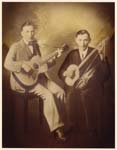 scan of two guys with instruments